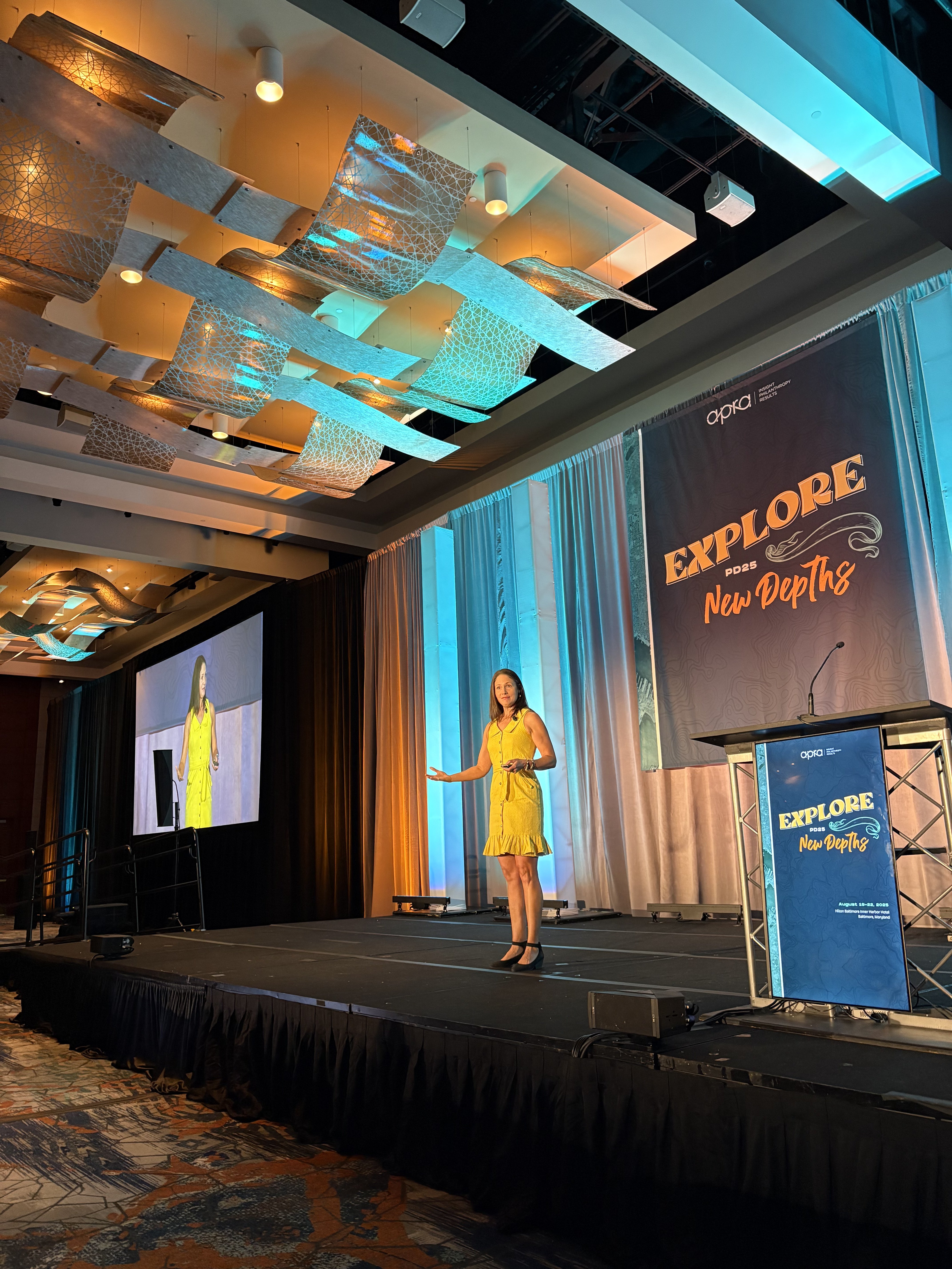 Leah Marone delivering a keynote at Apra